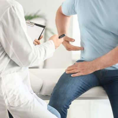 Male patient meeting with a urologist